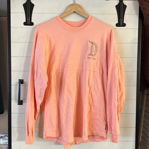 Disneyland Spirit Jersey, authentic, salmon pink. Never worn size XS
